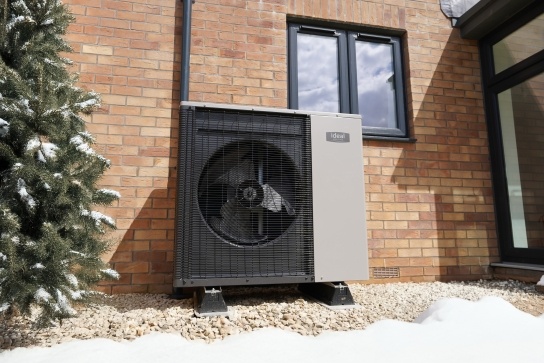 GLR Energy engineer discussing a heat pump installation